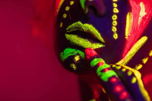 istock Young Woman With Fluorescent Makeup 1391771474