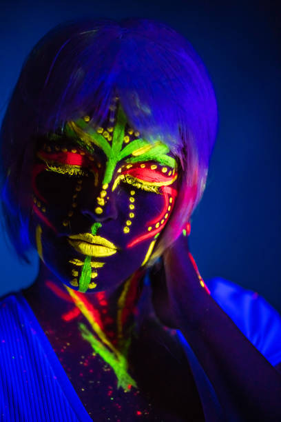 istock Young Woman With Fluorescent Makeup 1391771504