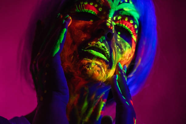 istock Young Woman With Fluorescent Makeup 1391772130