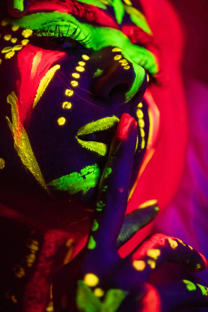 istock Young Woman With Fluorescent Makeup 1391772451