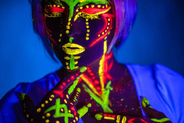 istock Young Woman With Fluorescent Makeup 1391772552