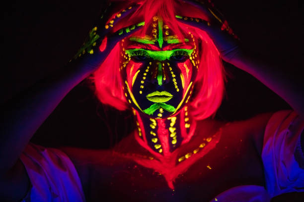 istock Young Woman With Fluorescent Makeup 1391773140