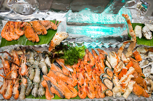 Close up of many Fresh Seafood buffet dinner put on ice