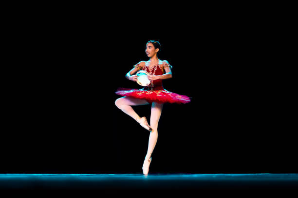 istock Young girl dancing La Esmeralda Ballet on stage 1391773308
