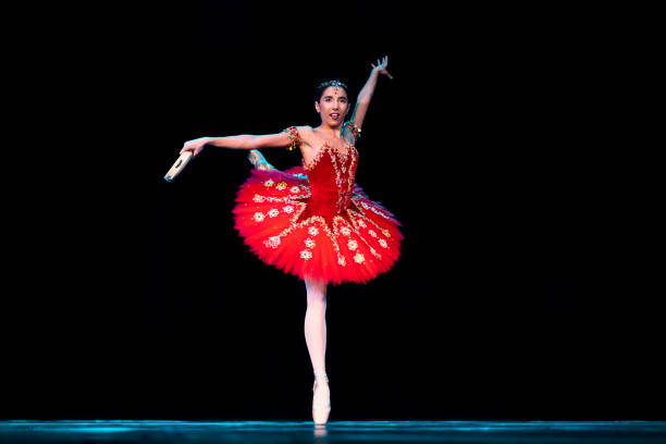 Young girl dancing La Esmeralda Ballet on stage