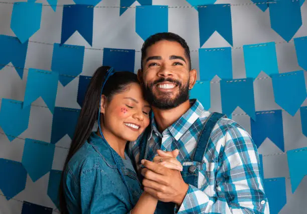 Photo of Party in Brazil, dreamy brazilian couple dancing at June Festival