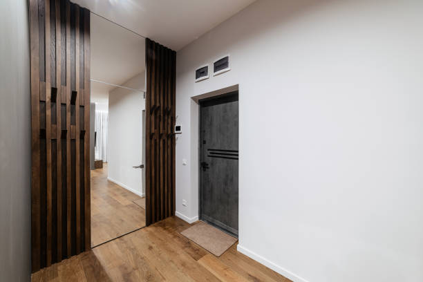 istock Interior design with mirrored doors and natural wood 1391778826