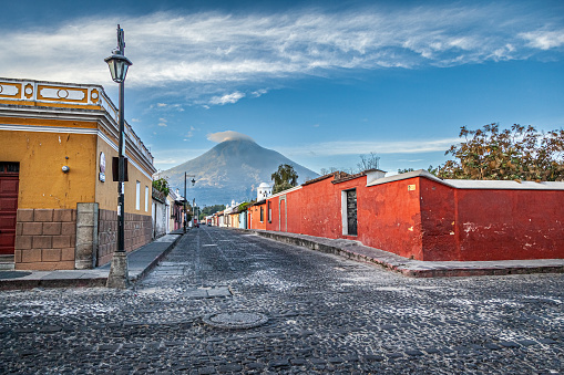 Street of Antigua, Guatemala and Agua Volcano.