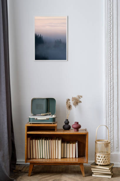 istock Retro style decor, books and vinyl player in room 1391780018