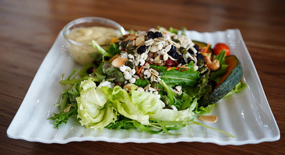 Salad food on plate on plate background