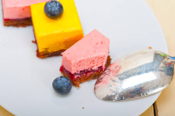 istock strawberry and mango mousse dessert cake 1391794069