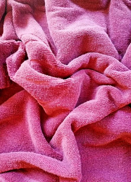 istock Red towel background in close up 1391797220