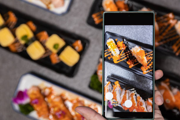 istock Sashimi sushi set with soy on black background.Assorted sushi set served on dark stone slate background. Top view 1391797270