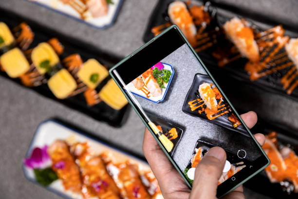 istock Sashimi sushi set with soy on black background.Assorted sushi set served on dark stone slate background. Top view 1391797274