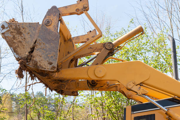 istock Excavator digs soil in village 1391799037
