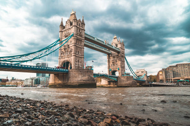 Tower Bridge on a cloudy day in London Tower Bridge on a cloudy day in London tower bridge london england bridge europe stock pictures, royalty-free photos & images