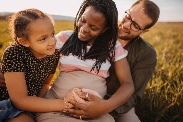 istock Playful family in wheat field 1391800344