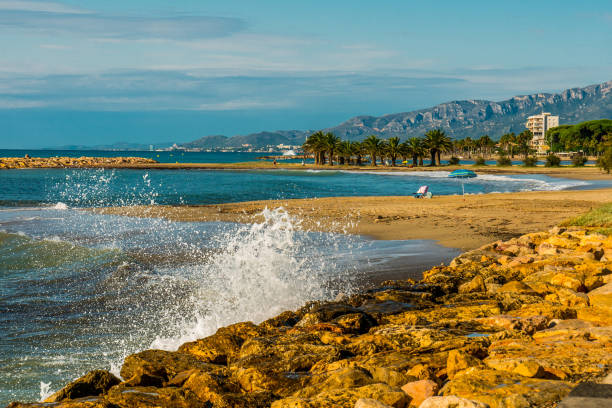 istock Seascape, surf at stones ridge on the shore 1391802807