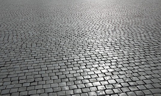 Square paved with setts also called SANPIETRINI in Italian Language
