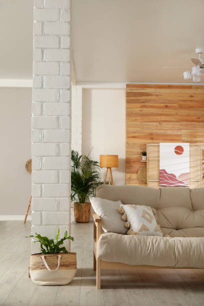 istock Light room interior with stylish wooden sofa. Idea for design 1391812057