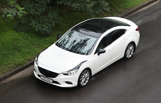 Belarus, Minsk-29.08.2021:A modern Toyota Camry is driving down the road.