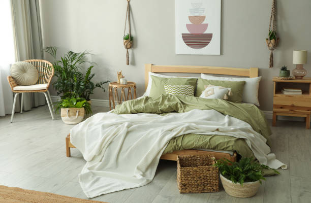 istock Stylish room interior with comfortable wooden bed 1391814487