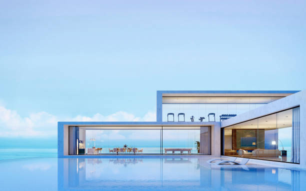 istock Modern luxury pool villa with sea view background.3d rendering 1391815266