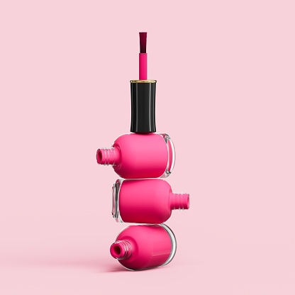 Esmalte de uñas botellas apiladas aisladas sobre fondo rosa ilustración 3D photo