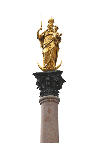 golden statue of madonna with baby jesus on white background in munich in the square called Marienplatz