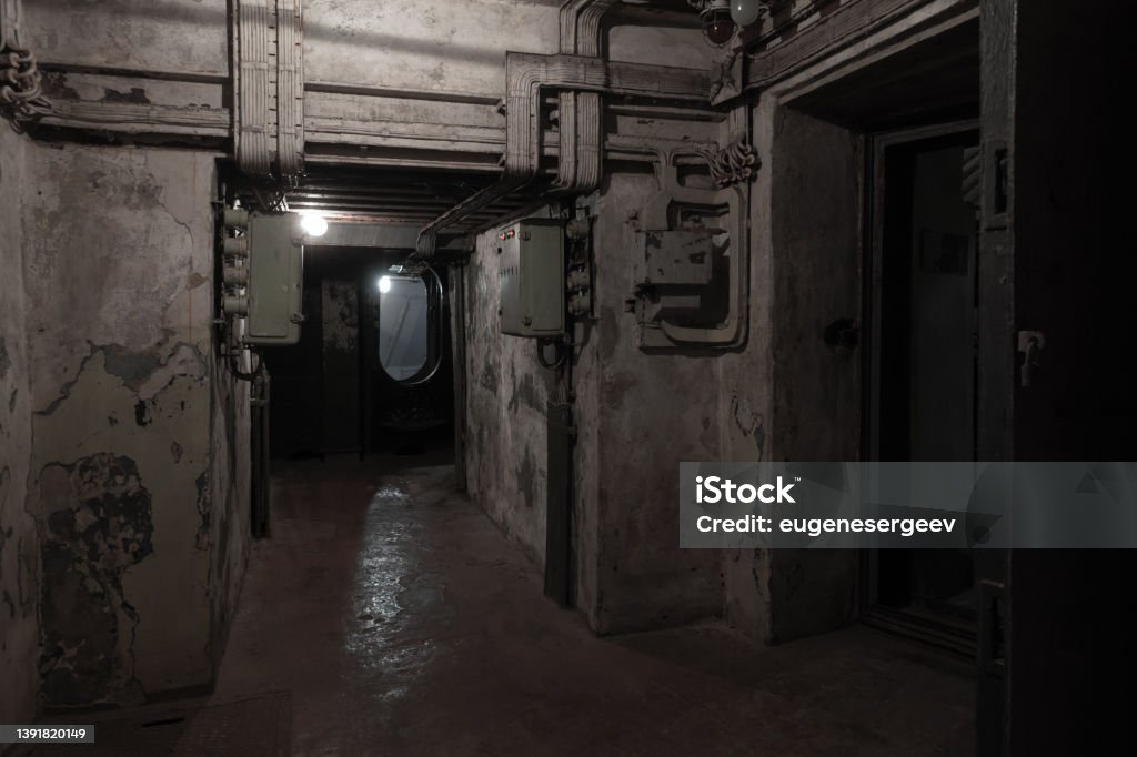 Abstract dark military bunker interio Abstract dark military bunker interior, grungy underground rooms Door Stock Photo