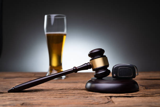 DUI Lawyer. Car Key And Gavel DUI Lawyer. Car Key And Gavel On Wooden Table driving under the influence stock pictures, royalty-free photos & images