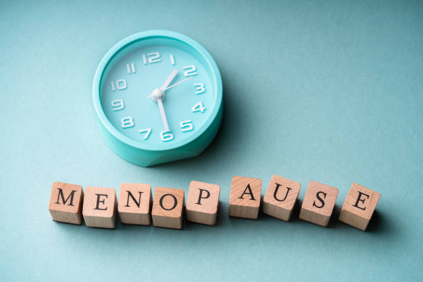 istock Menopause Time Clock Wooden Block Text 1391821241