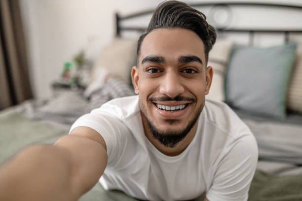 istock A young man spening day at home and feeling relaxed 1391823325