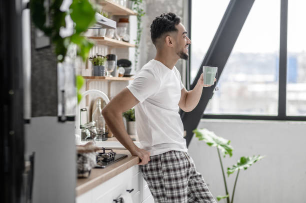 istock A young man spending morning at home and having coffee 1391823404