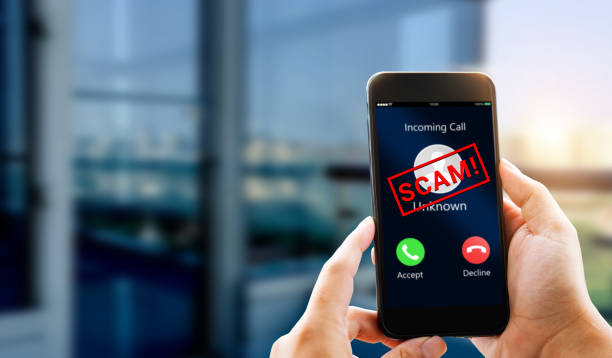 Phone Scam, fraud or phishing concept. Unknown caller show on mobile phone screen. white collar crime stock pictures, royalty-free photos & images