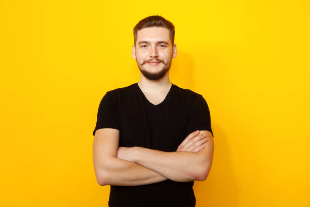 istock Studio portrait of a 22 year old bearded man 1391826415