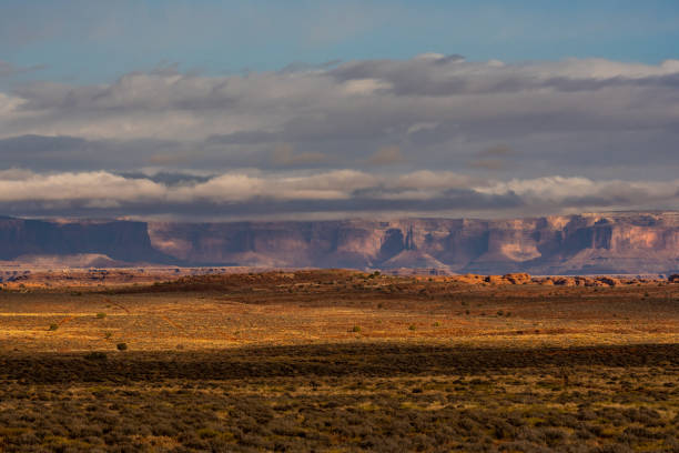 istock Shadows Cover The White Rim In Canyonlands 1391828399