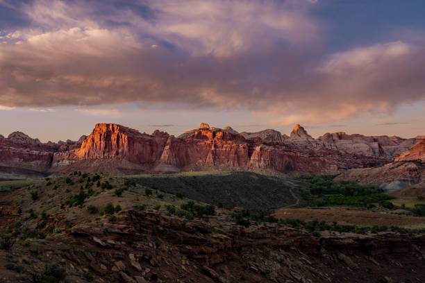istock Sun Lights Pink Rocks At Sunset Over Capitol Reef 1391828608