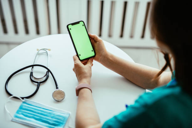 istock Nurse or doctor using digital device for electronic banking 1391829497
