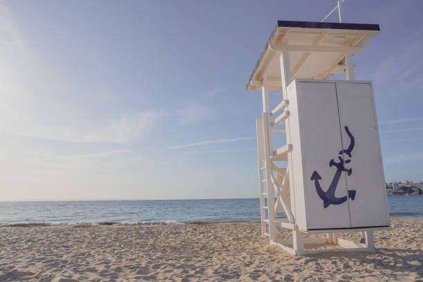 istock Life guard's lookout tower at a beach 1391831171