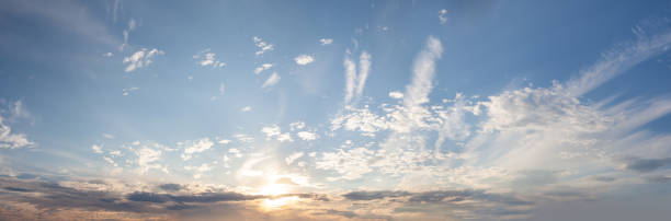 istock Panorama of a blue sky with white clouds, dawn backround 1391836874