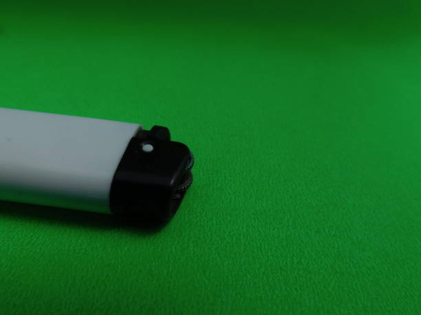 istock white match isolated on green background 1391841400