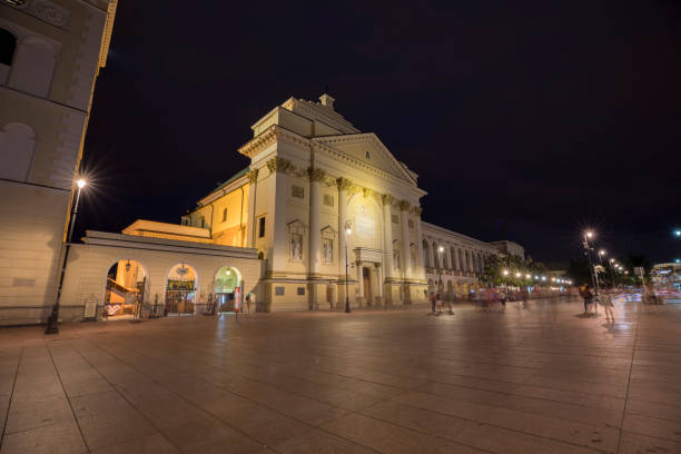Warsaw, Poland - August 21, 2019: Exterior view of the buildings in Warsaw old town square at night.