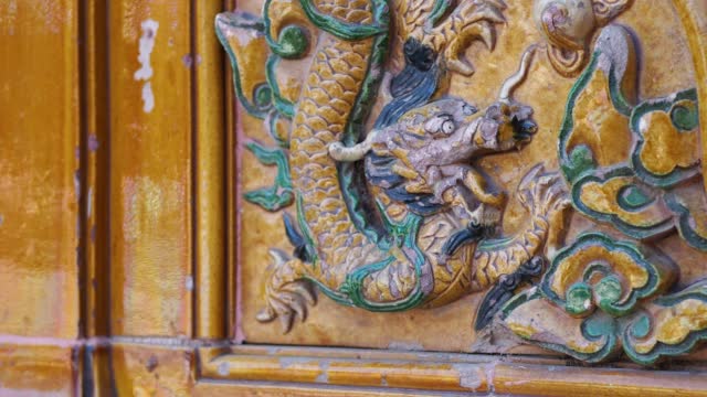 Colored Glazed Tile Chinese Dragon Relief in Beihai Park, Beijing, CHINA.
