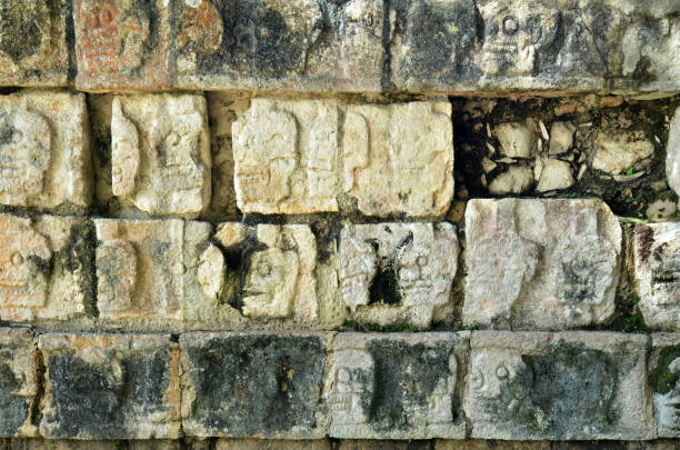 istock Chichen Itza Mexico, Mayan Ritual structures, masks, sacrificial site, old wall, Wall and stone of Mayan pyramids 1391868325