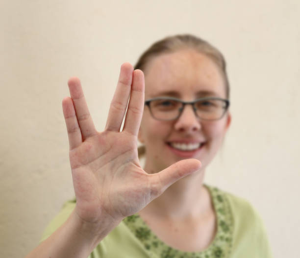 istock A young woman showing meme sign language. 1391869877
