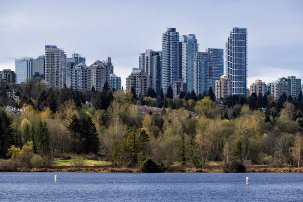 Burnaby cityscape viewed from Deer Lake in spring time, BC,  Canada stock photo
