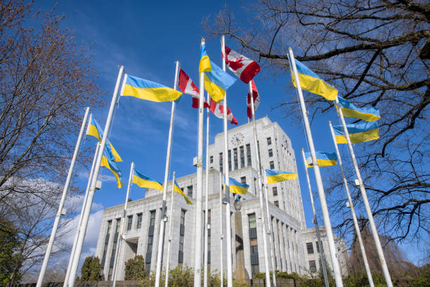 Ukrainian Flags and Canadian Flags in front of City Hall, Vancouver, Canada stock photo