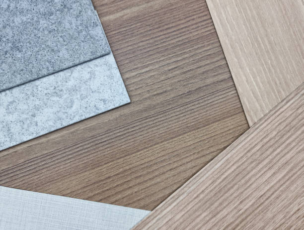 istock close up view of interior material samples including oak and ash laminateds, grey grainy artificial stones, fabric interior wallpaper. interior material board with blank space for design. 1391885578