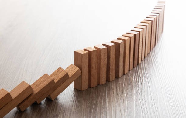 istock A lot wooden block standing in a line. 1391886434